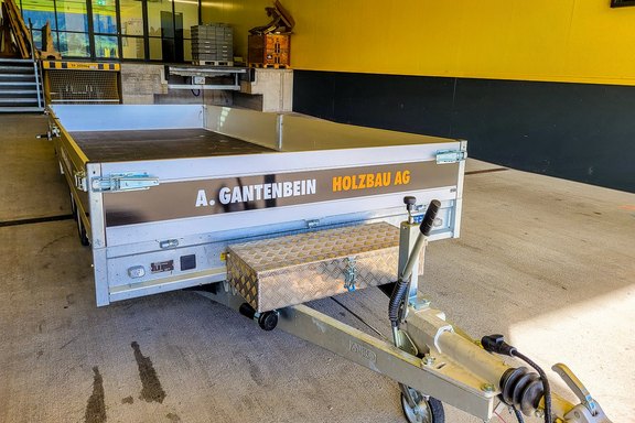 Gantenbein Holzbau - Anhängerwerbung Anhänger, Werbung, Seiten, Druck