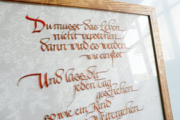 Kalligraphischer Spruch als Dekorelement Bild mit Rahmen